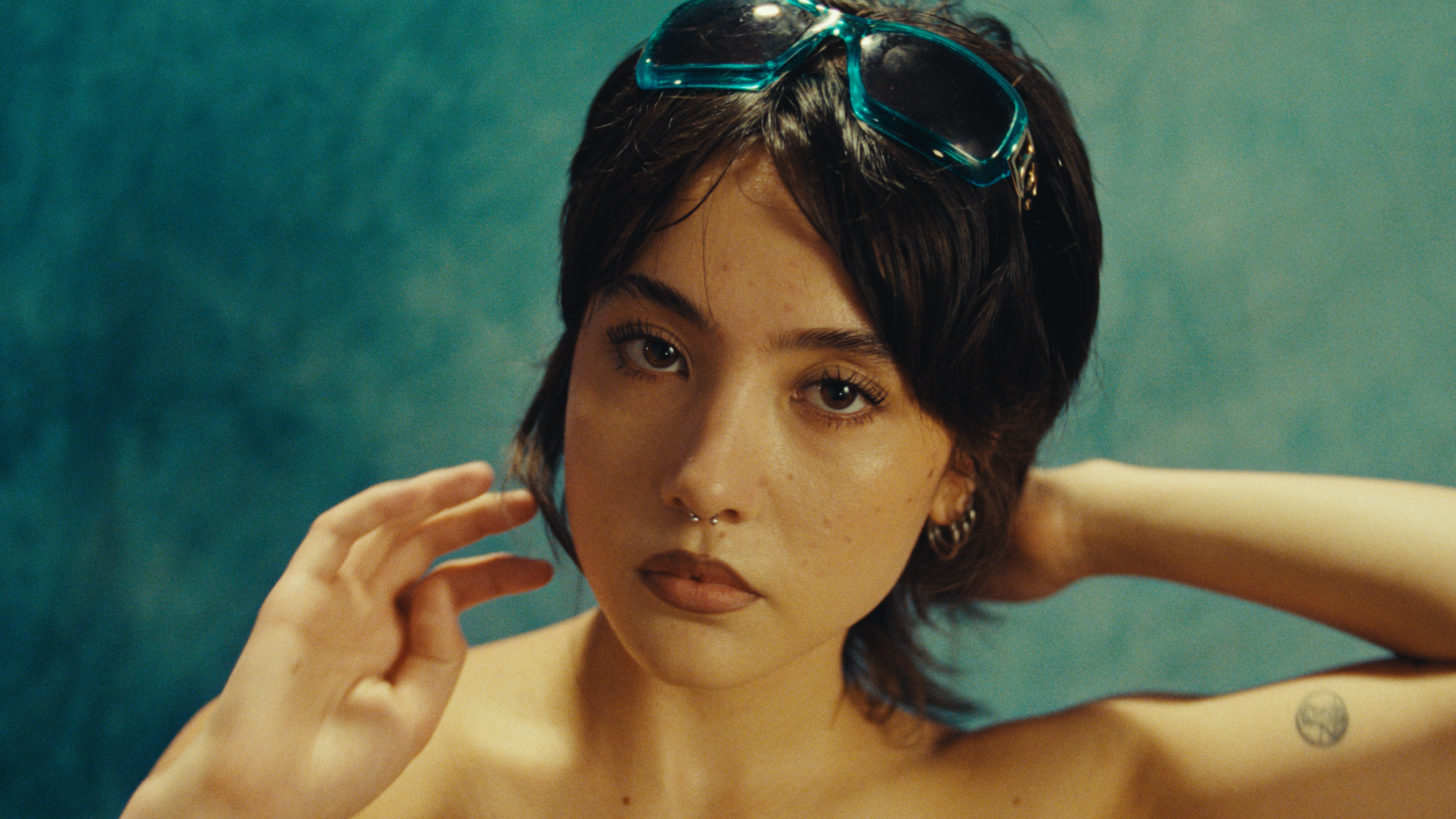 Portrait with teal sunglasses